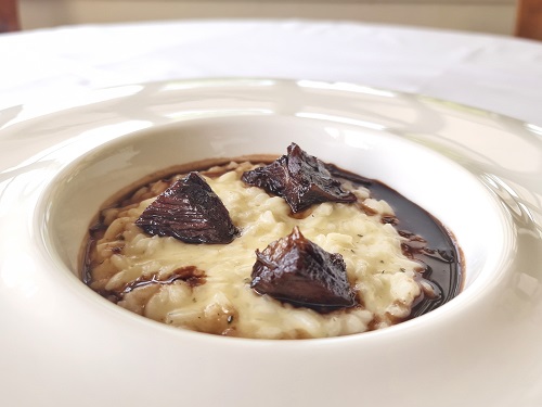 Fermented lemon risotto, tequila, rosemary and red wine asado